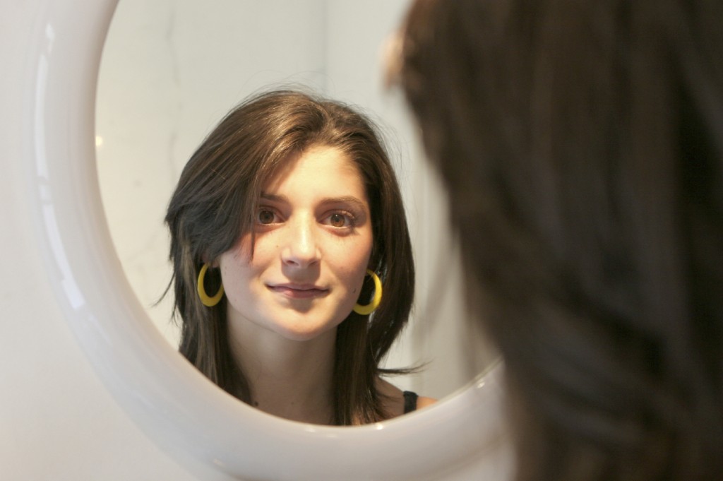 women looking in a mirror