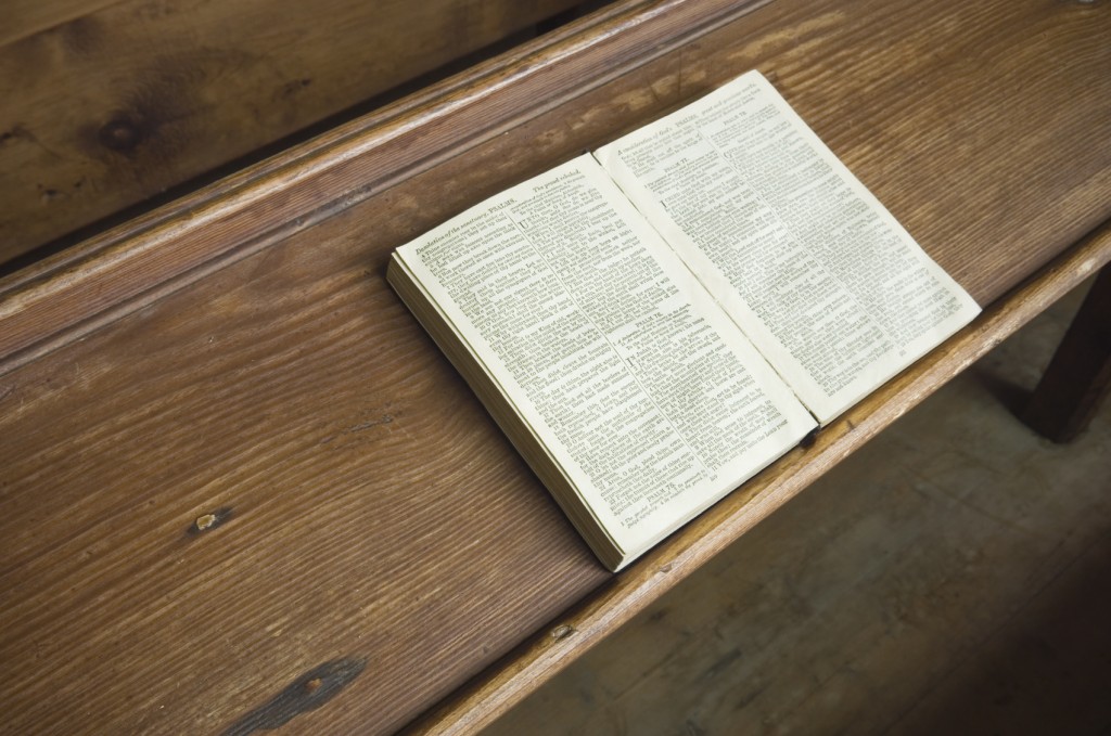 Open bible on pew in small church