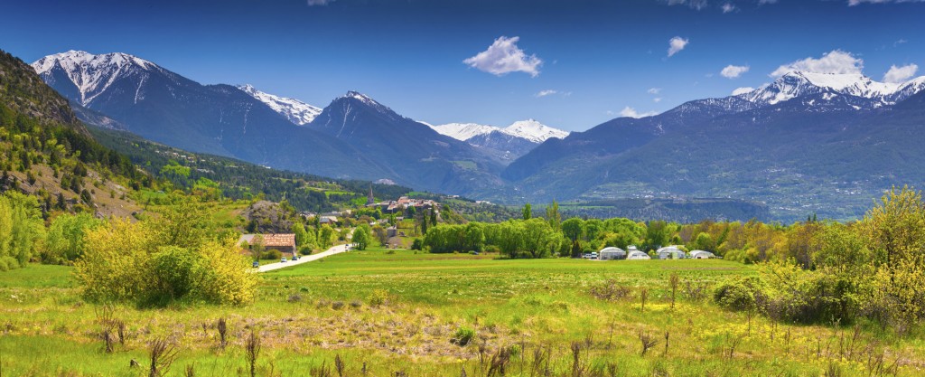 Panorama of the French Alps in the sunny summer morning