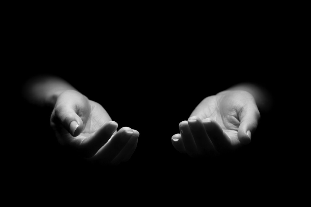 Hands Reaching Out in prayer