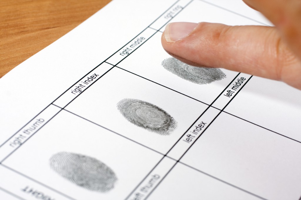 A fingerprint on a white sheet of paper