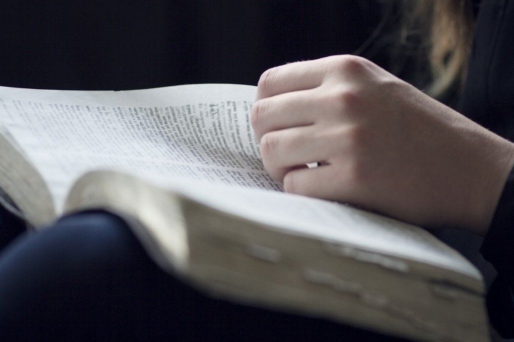 Woman reading the Bible