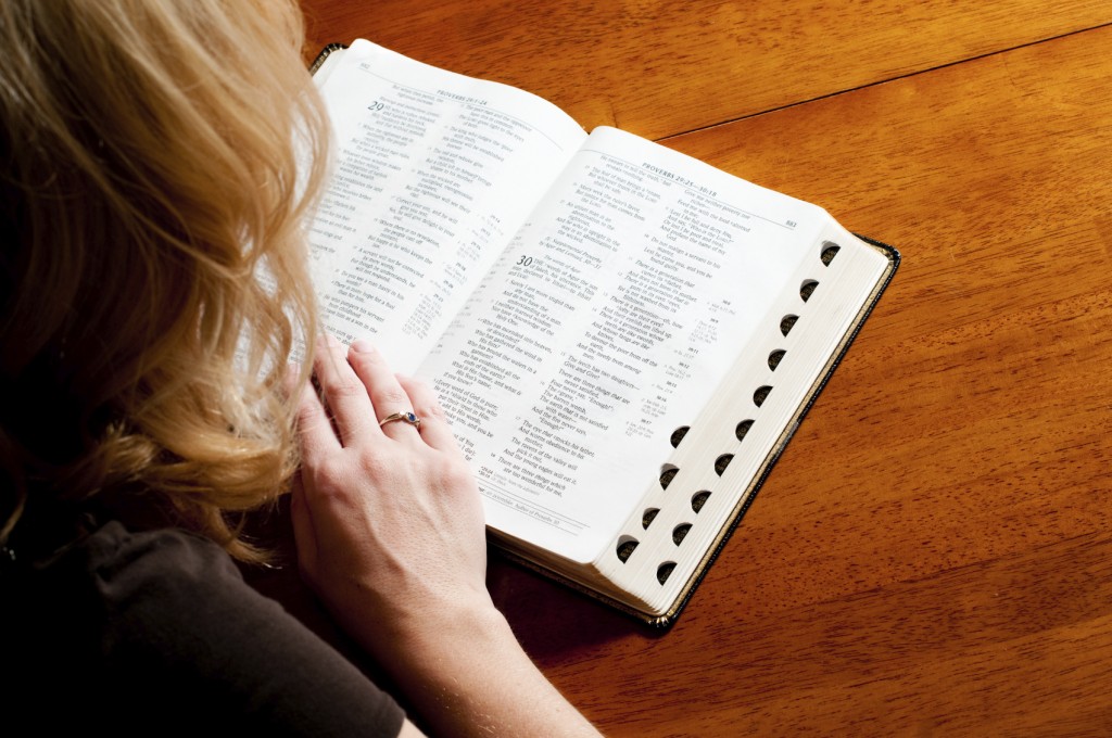 woman reading her Bible
