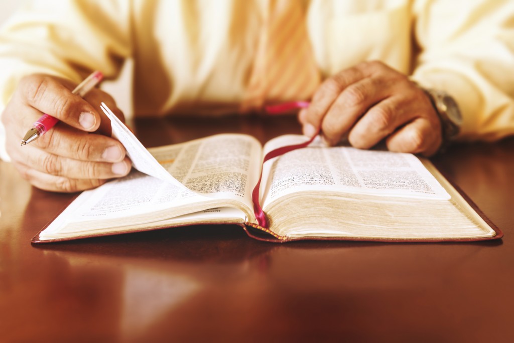 Man or Pastor studying teaching the Bible