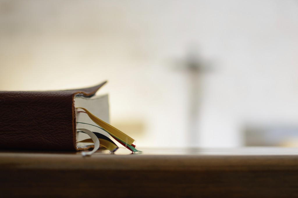 Bible on bench in church