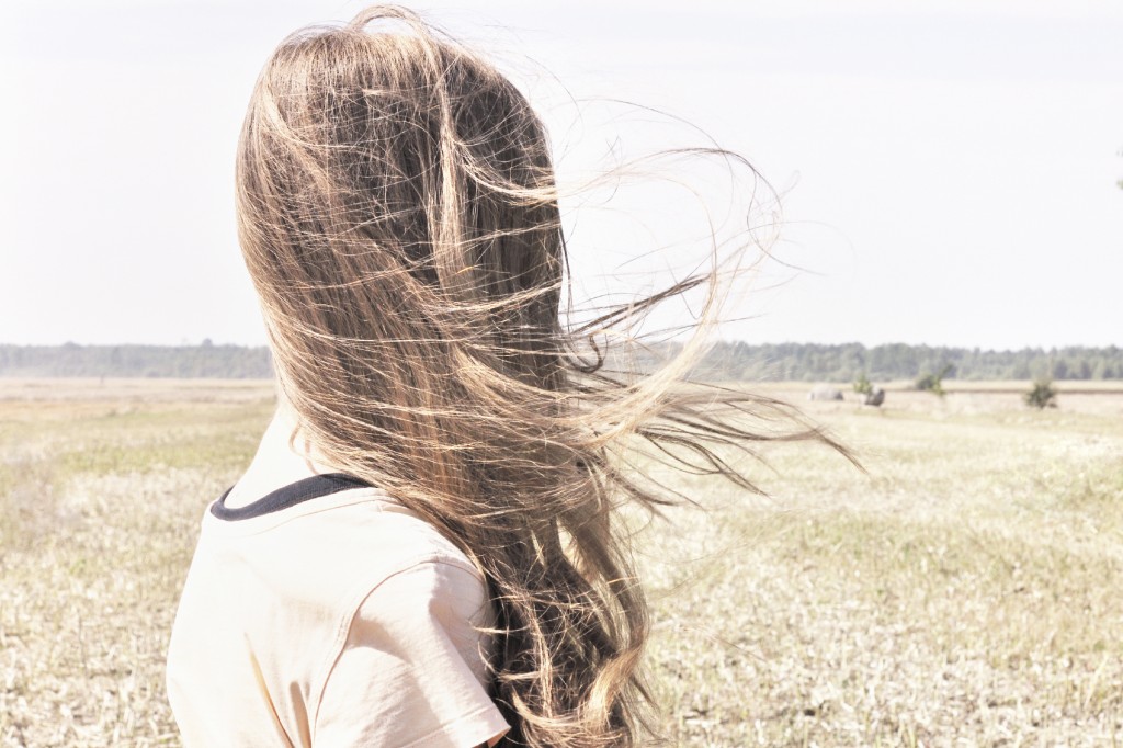 Wind whips through young girls hair