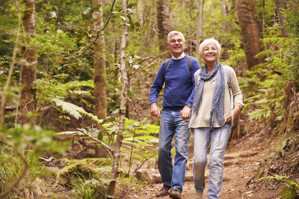 Senior couple walking together in a forest