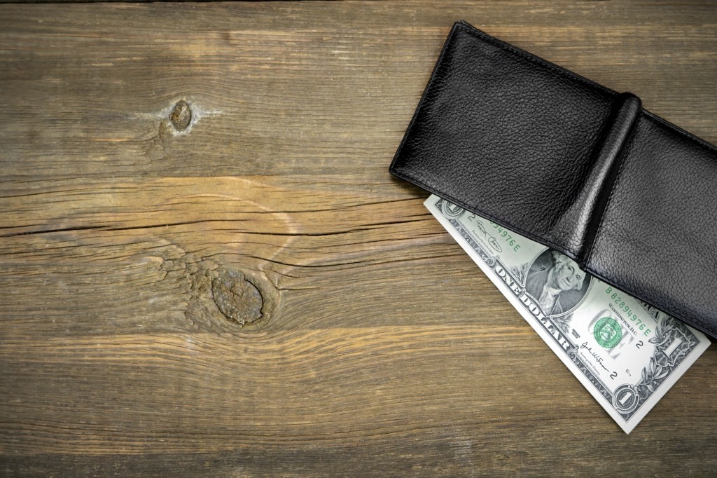 Open Male Black Leather Wallet With One Dollar Bill