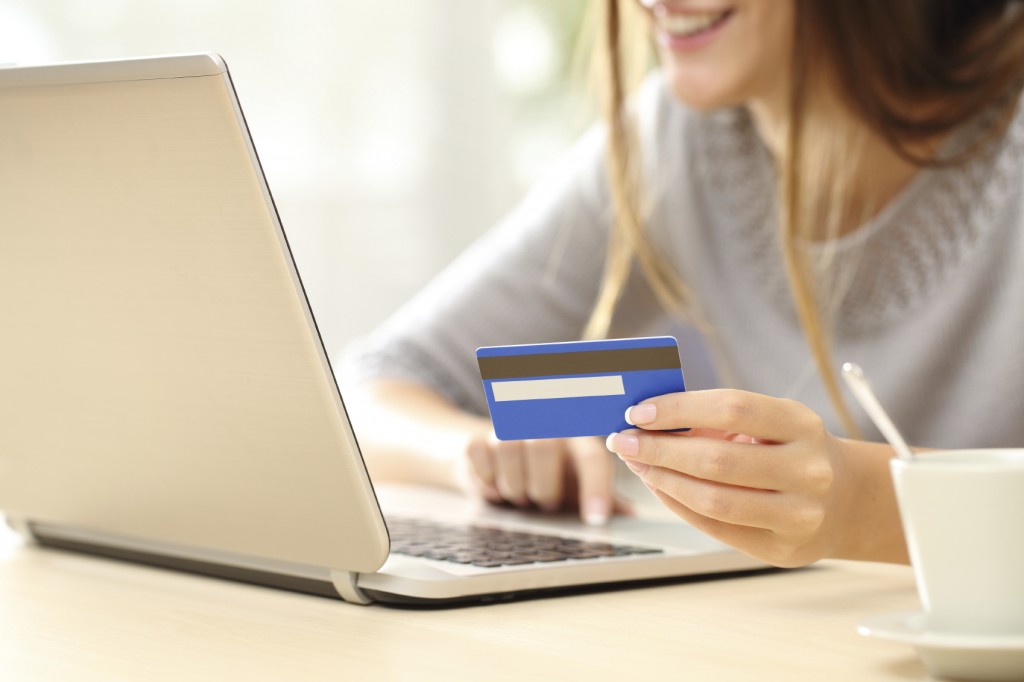 Woman buying online with credit card