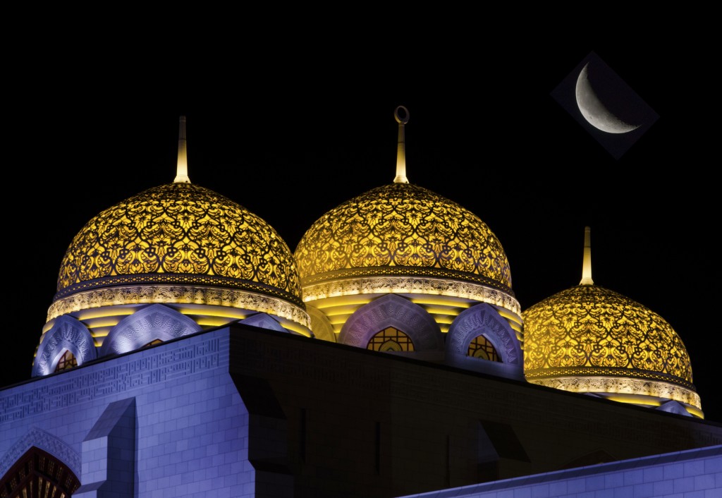 Domes at mosque with moon