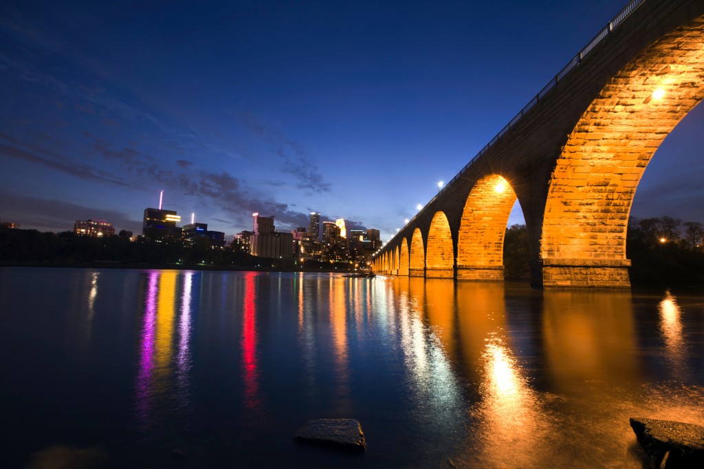 stone arch bridge in Minneapolis Minnesota cityscape