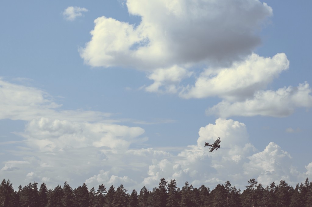 World War II airplane on cloudy sky
