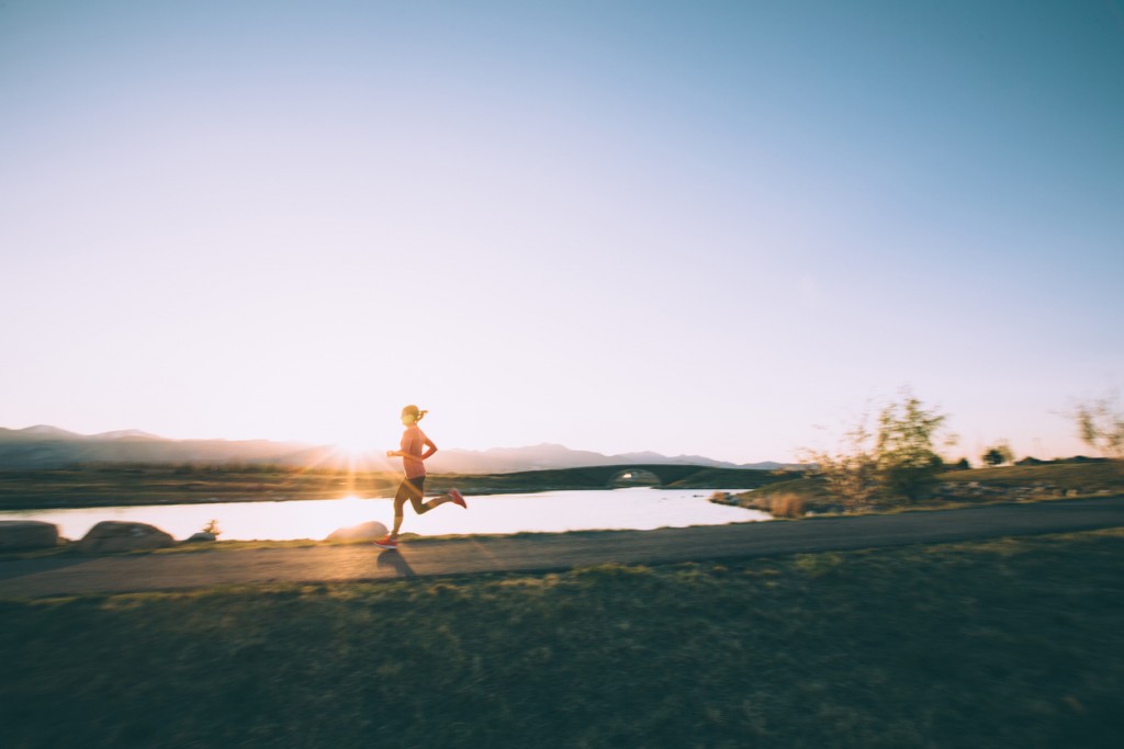 Female Running on Path During Sunset in Utah