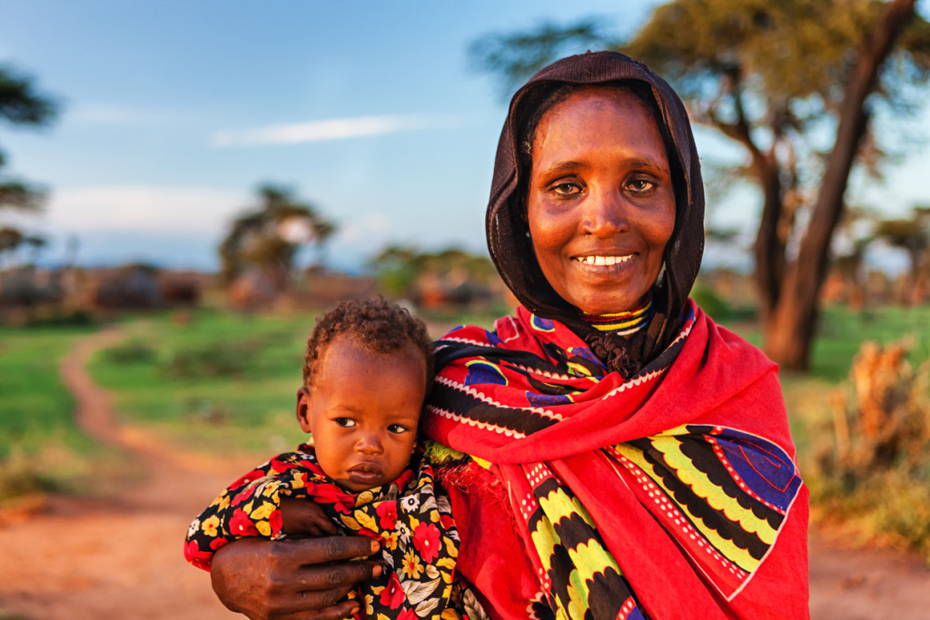 Woman from Borana tribe holding her baby, Ethiopia, Africa