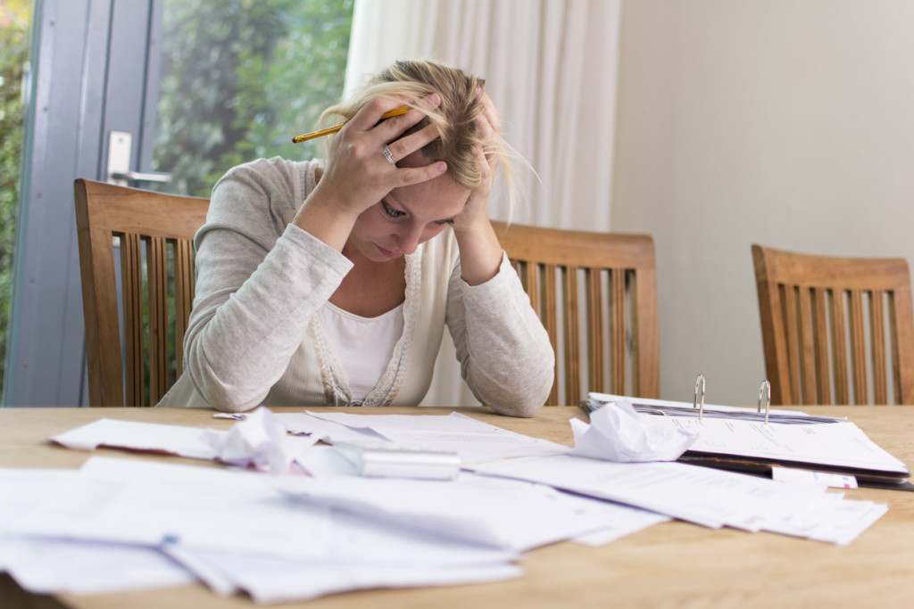 Woman worried about financial problems. Jobless or to many bills