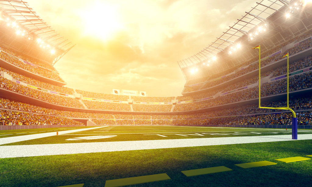 American football stadium wide angle with sun flare