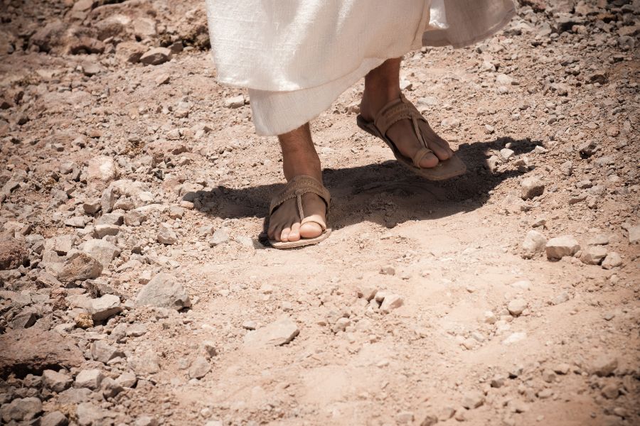 Jesus' feet walking through the desert